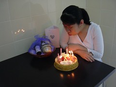 Irene's blowing the birthday cake.