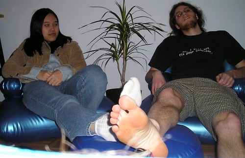 Charlotte and Mike Burns sit in inflatable furniture