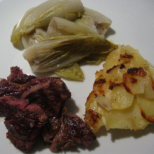 Rib-eye, potato gratin and chicory